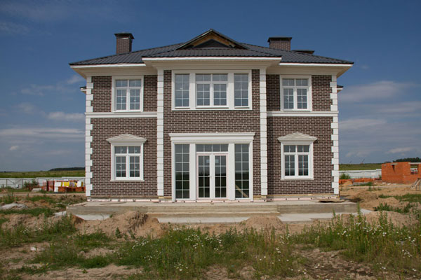 Купить термопанели для особняка на фото видно, что купить термопанели стоит для сложного проекта с использованием разных фасадных материалов